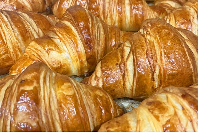 10+ tastings Gourmet Food & Wine Tour in the Heart of Paris - Stop 1: Tartine & Co Louvre for croissants and the jambon beurre