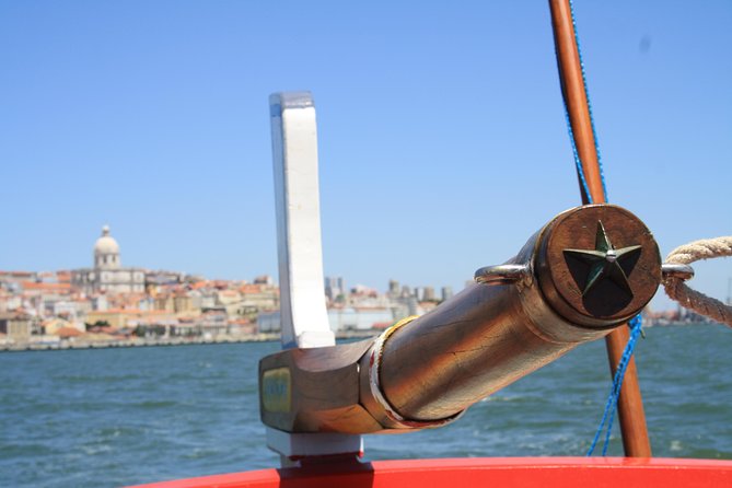 2-Hour Lisbon Traditional Boats Sunset Cruise with White Wine - The traditional boat experience: historic feel, practical comfort