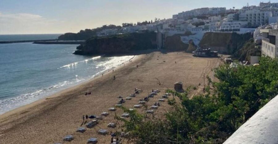 Albufeira: Old Town History Walking Tour with Tapas & Wine - Churches, historic buildings, and that tunnel moment