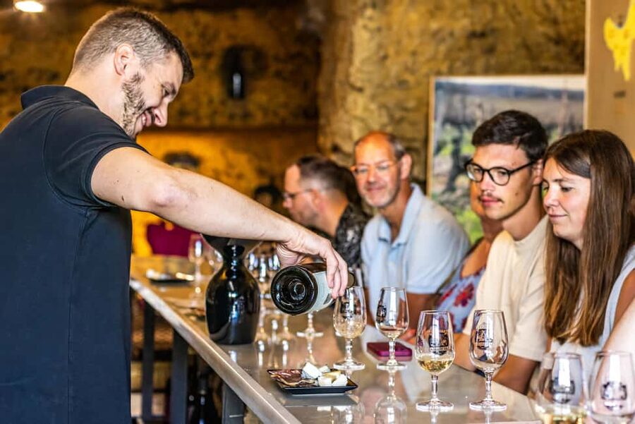 Amboise: Caves Ambacia Visit and Wine Tasting - Vintages Odyssey: 150 years of wine history in the caves