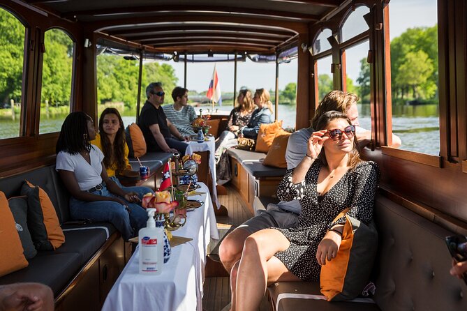 Amsterdam Canal Cruise with Cheese and Wine - Departure Points, Meeting the Crew, and Getting a Good View