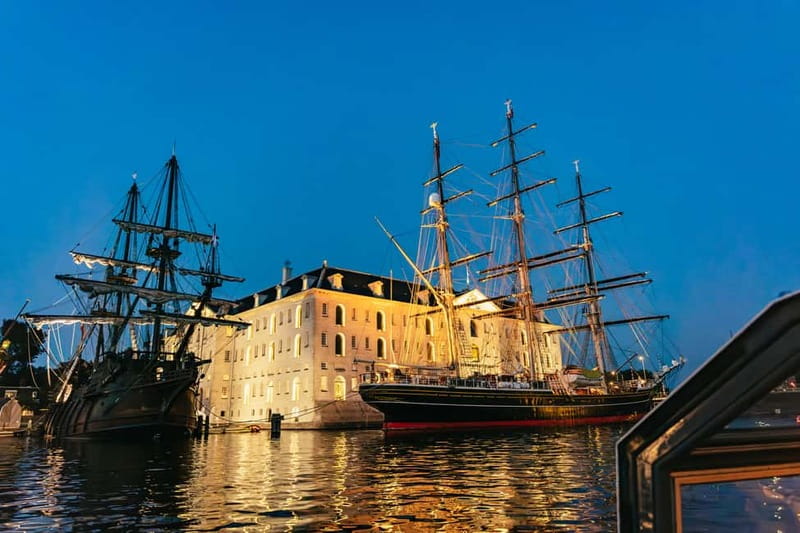 Amsterdam: Cheese & Wine Cruise Tasting Experience - Passing Amsterdam Centraal and the City’s Waterline Stories