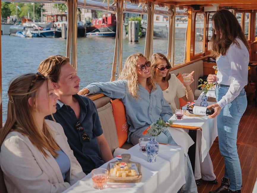 Amsterdam: Classic Boat Cruise with Optional Cheese & Wine - The Skipper and Host Make the Difference: Stories That Keep Up With the Sights