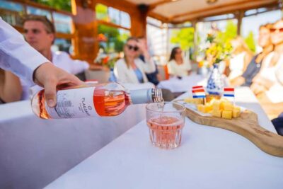 Amsterdam: Classic Saloon Boat Cruise with Cheese & Wine - Covered Saloon Comfort and a Smooth Boarding Reality