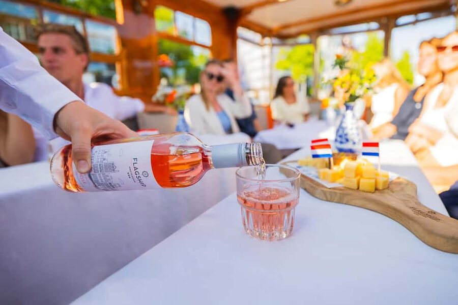 Amsterdam: Classic Saloon Boat Cruise with Cheese & Wine - Covered Saloon Comfort and a Smooth Boarding Reality