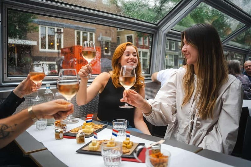Amsterdam: Cozy Cheese & Wine Cruise Tasting Experience - What You’ll See: Damrak, the Canal Belt, and Magere Brug at Night