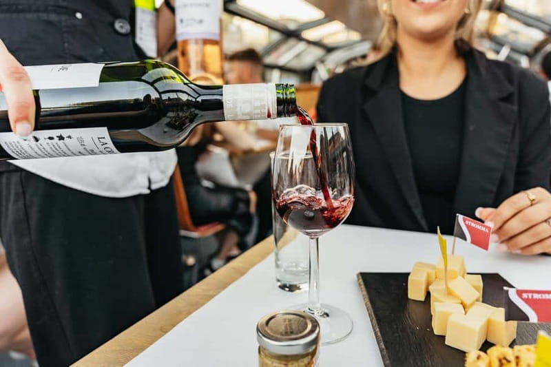 Amsterdam: Cozy Cheese & Wine Cruise Tasting Experience - Getting to Damrak Pier 5 (and What 75 Minutes Feels Like)