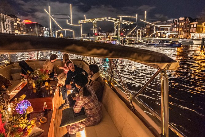 Amsterdam Small-Group Evening Canal Cruise Including Wine, Craft Beer, Cheese - Landmark passes you’ll recognize: Anne Frank House, Skinny Bridge, Amstel, 7 Bridges, De Wallen