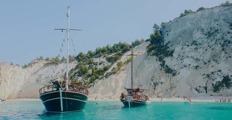 Argostoli: Full-Day Boat Trip with Lunch & Wine - Xi Beach’s red sand and clay spa treatment