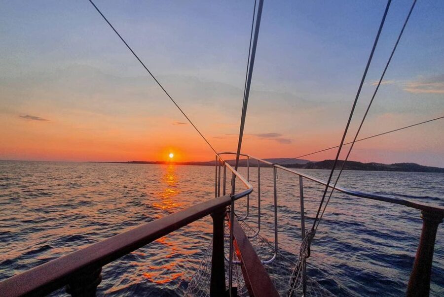 Argostoli: Sunset Cruise with Swim Stops, Dinner, and Wine - What the crew does (and why the atmosphere feels different)