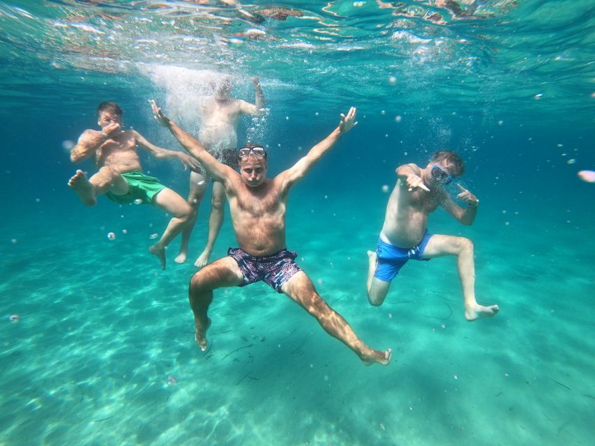 Athens: Catamaran Cruise with Fresh Lunch and Wine - Swim stop 2 around Vouliagmeni Bay: another chance to cool off