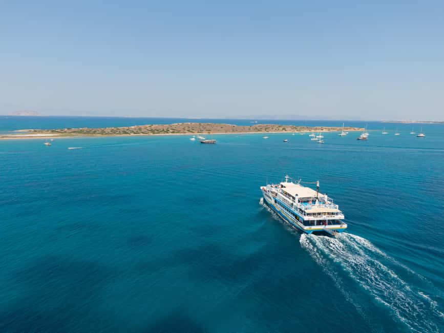 Athens: Swimming Cruise with Lunch, Wine & Live DJ on Board - Drinks included: what unlimited wine and soft drinks really means