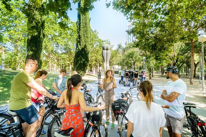 Barcelona E-Bike Small Group Tour with Tapas & Wine Tasting - Barceloneta, Port Olímpic, and Port Vell: from fishing quarter to old-harbor icons