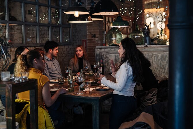Barcelona: Guided Food Walking Tour with Tapas and Wine - Carrer de la Mercè: A Classic Bodega Moment (Boquerones, Butifarra, and the Porrón)