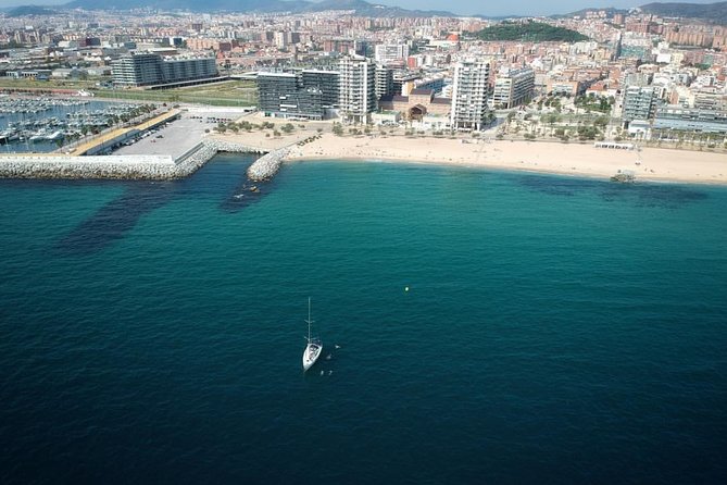 Barcelona Private Sailing Trip with unlimited drinks and snacks - A one-hour private sail built for good water (not long speeches)