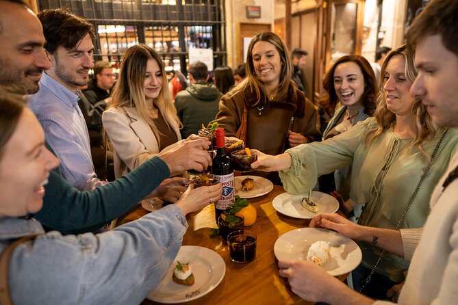 Barcelona Side Streets Tapas & Wine Tour - Stop 1: Perikete and the 2000-year-old wall (wine with pours from a porrón)