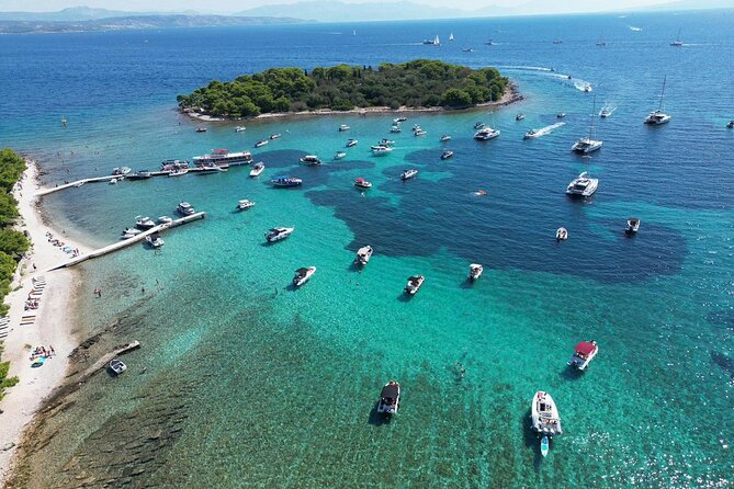 Blue Lagoon Tour from Split with Bottled Water and Wine Included - Blue Lagoon and Krknjasi Bay: Snorkel, Swim, Repeat