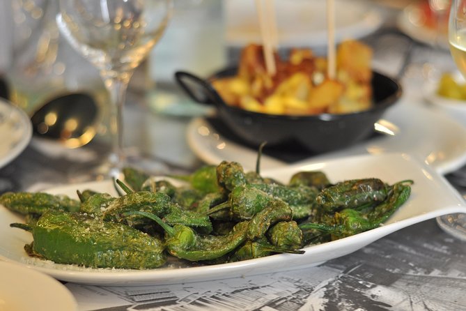 Born to Eat: Gourmet Tapas & Wine Small Group Tour in Old Barcelona - Passeig del Born: the name story you’ll actually remember