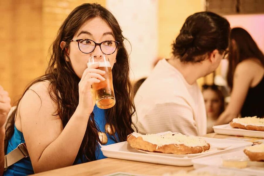 Budapest: Guided Street Food Tour with Sweet Wine - Sit-down Hungarian classics: nokedli dumplings and Flódni