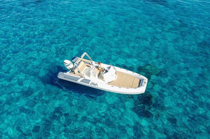 Cagliari Boat Tour by Maxi Rib - Wine and Snorkeling - Sella del Diavolo: Devil’s Saddle views plus wind-dependent cove stops