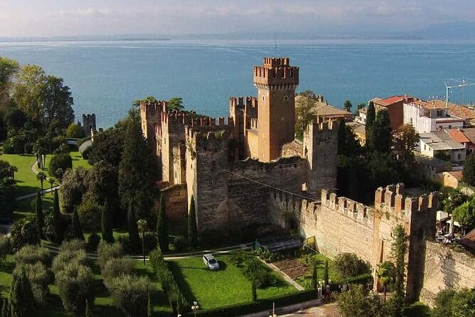 Castles boat tour with Bardolino wine tasting and nibbles - Swim stop on Lake Garda: how to set yourself up for the highlight
