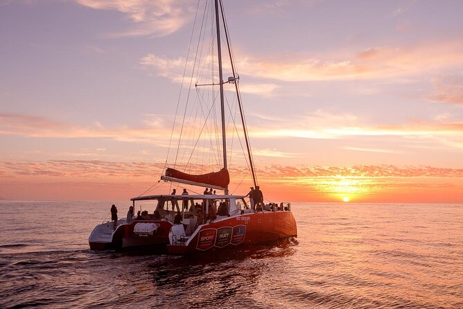 Catamaran Sunset Champagne Cruise Cape Town - Sunset from the water: Table Mountain and Robben Island, no land-blocking