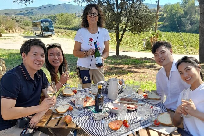 Cava tour to 3 family wineries with hotel pick-up - Stop 2: A centuries-old cellar, paired with lunch in the garden