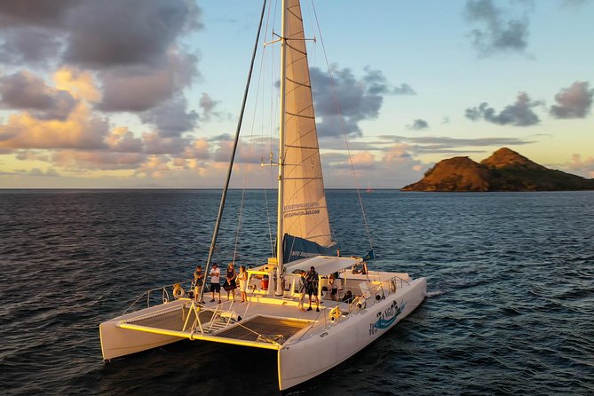 Champagne Sunset Sail in St. Lucia - How the 2-hour sunset catamaran outing runs on St. Lucia time
