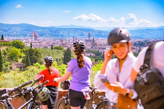 Chianti Hills E-Bike Tour with Tuscan Lunch & Two Wine Tastings - Riding out of town: what Impruneta and the first photo pauses feel like