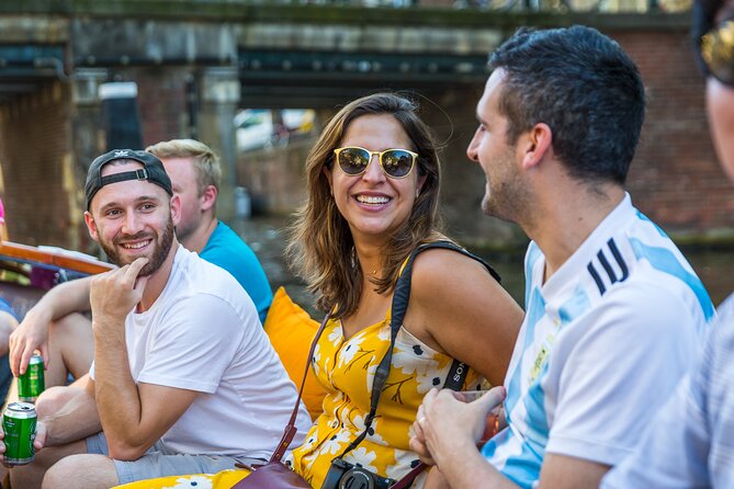 Classic Salonboat Tour in Amsterdam Including Cheese and Wine - Amstel River views: bridges, theaters, and canal architecture