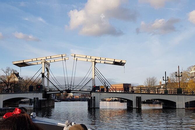 Classic Salonboat Tour in Amsterdam Including Cheese and Wine - Magere Brug and the canal ring: Amsterdam’s postcard core