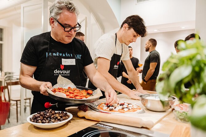 Devour Rome Wine & Pizza Making Class in Trastevere Neighborhood - From toppings to oven time: building your pizza and learning the bake