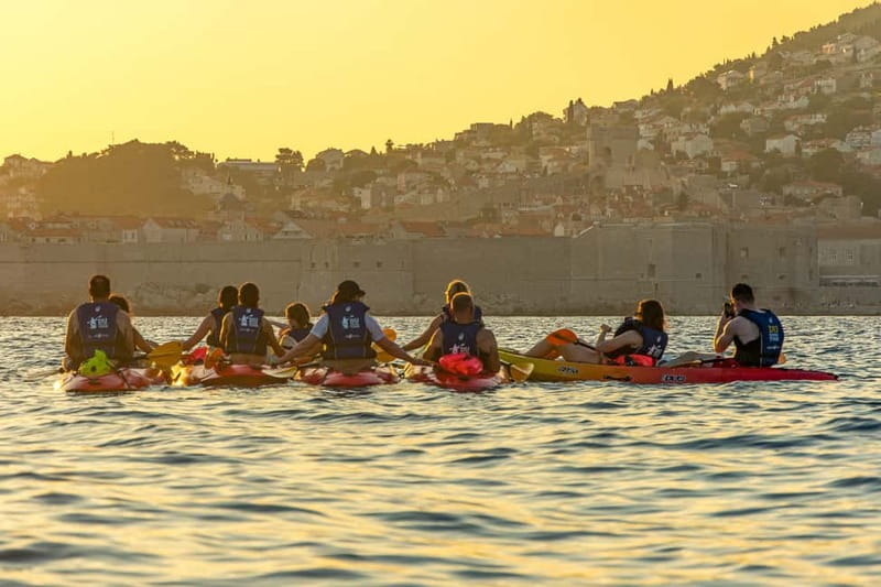 Dubrovnik: Guided Sunset Sea Kayaking Tour with Wine - Key highlights at a glance