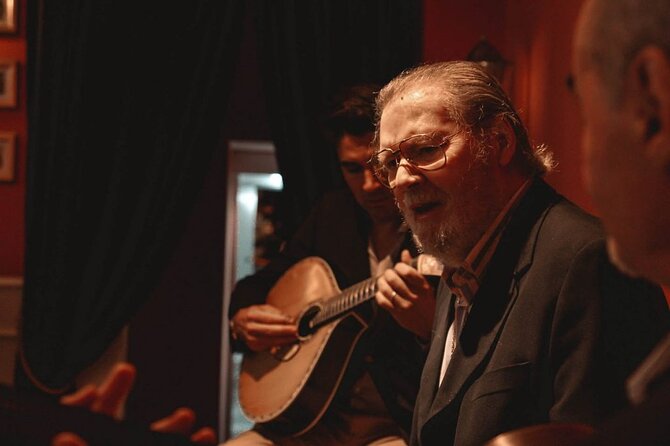 Fado Show with Port Wine at Historic Lisboa em Fado - Language: English and Portuguese, plus a friendly way to follow along