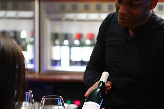 French Wine and Champagne Tasting in Paris - Bread, water, and the cheese or charcuterie upgrade