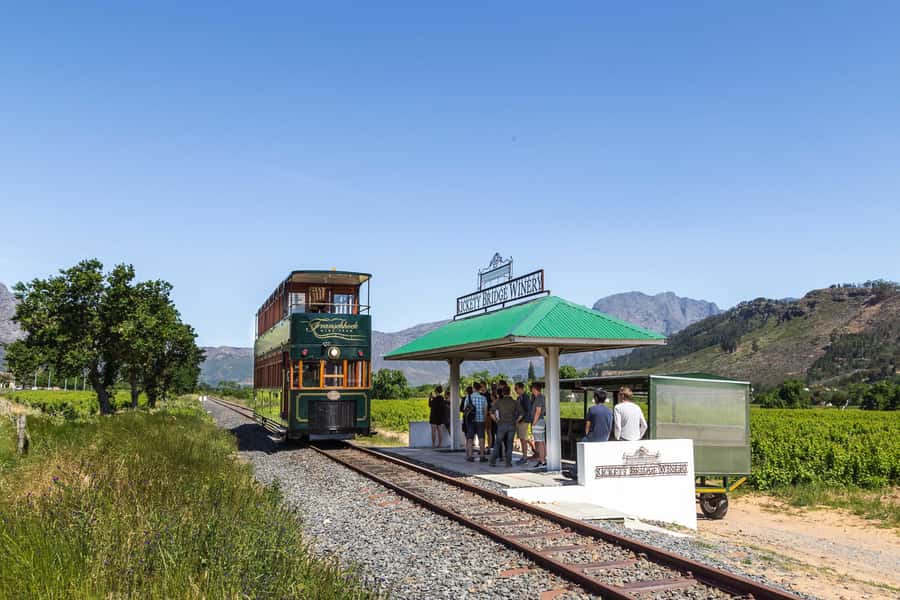 From Cape Town: Franschhoek Wine Tram Hop-on Hop-off - The Luxury Coach Ride: Wi‑Fi, Comfort, and Pickup Timing