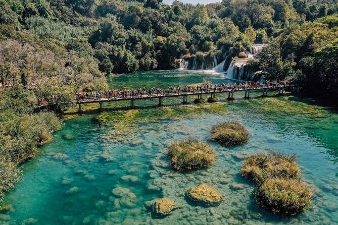 From Split: Krka Waterfalls, Food & Wine Tasting Tour - Krka National Park: Walkways, Falls, and Swimming Rules