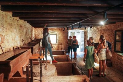From Split: Krka Waterfalls, Food & Wine Tasting Tour - Getting out of Split: air-conditioned bus and first tips