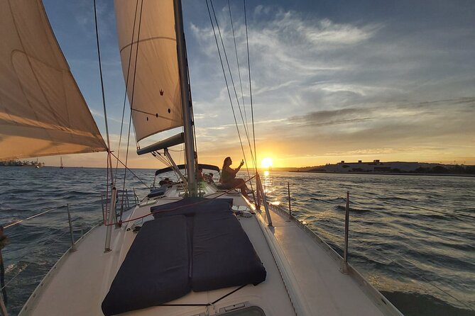 Golden Hour Boat Tour - Sailing by the Monuments with Wine - Setting Off From Doca de Santo Amaro: Simple and Scenic
