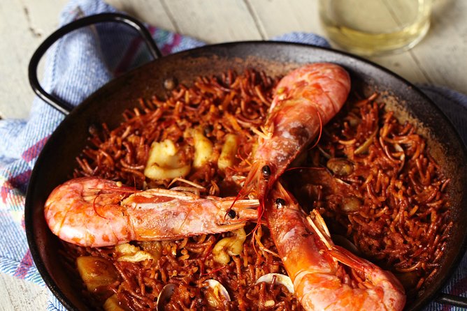 Interactive Paella & Market: Bottomless Wine & Rambla Views - Spanish Tortilla: The Secret Behind the Omelette