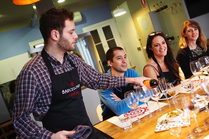 Interactive Paella & Market: Bottomless Wine & Rambla Views - The Kitchen Setup: Real Stations, Real Cooking Time