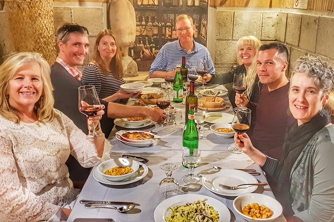 Jewish Ghetto and Campo Dè Fiori By Night Food, Wine and Sightseeing Tour - Campo de’ Fiori at night: pizza, cured meats, and the square with teeth