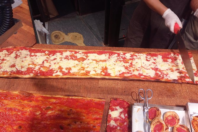 Jewish Ghetto and Campo Dè Fiori By Night Food, Wine and Sightseeing Tour - Piazza Navona: tiramisù first, then baroque history