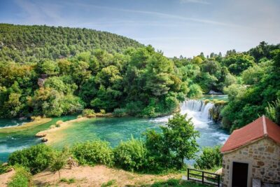 Krka Waterfalls and wine tasting Tour from Split or Trogir - Entering Krka: Skradinski buk and the Boardwalk Mindset