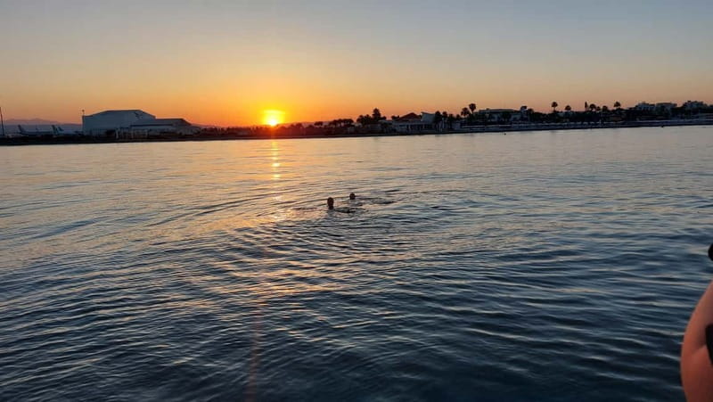 Larnaca: Sunset Cruise with Unlimited Wine & Beers - Mackenzie Beach swim stop: short, sweet, and timed for the evening