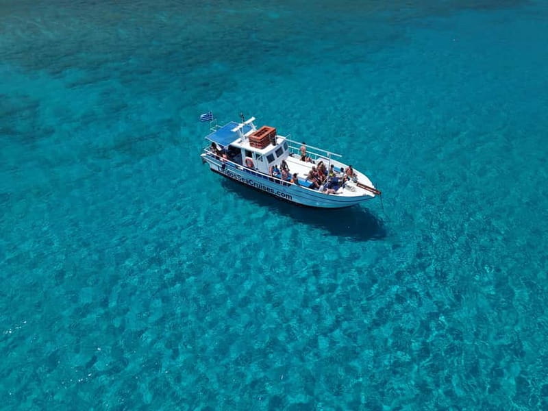 Lindos: Sunset Cruise with Unlimited Aperol, Beers & Wine - Your swim and snorkel chances near St Paul’s Bay and Navarone Bay