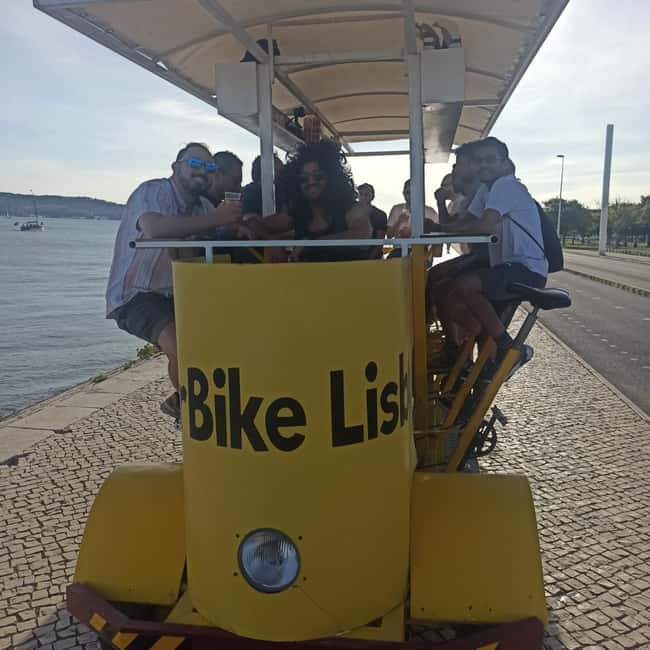 Lisbon: 1-Hour Beer, Sangria or Wine Bike Sightseeing Tour - Music, lights, and keeping the vibe friendly