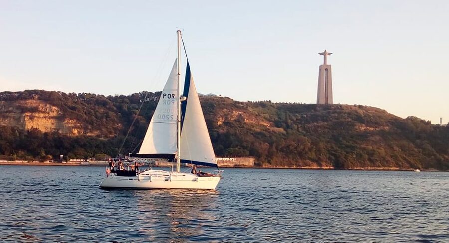 Lisbon: Sailing Tour with Wine and Snacks - Sailing from Alcântara: a small-boat view with real wind