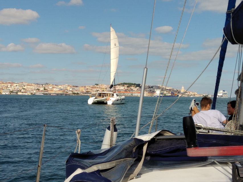 Lisbon: Sailing Tour with Wine and Snacks - Alfama from the water: seeing a neighborhood without the stairs