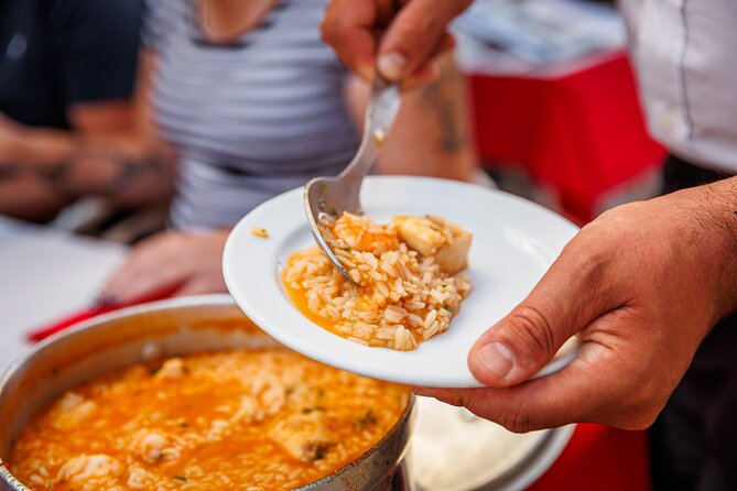Lisbon Small-Group Portuguese Food and Wine Tour - Rua da Madalena: bifana with draft beer